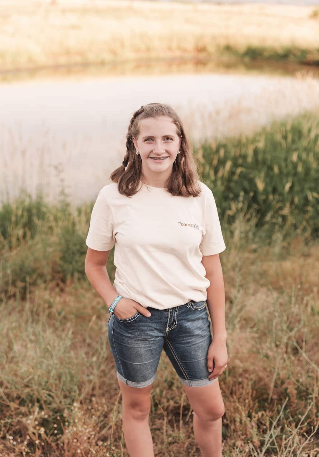 Jill standing and smiling at the camera